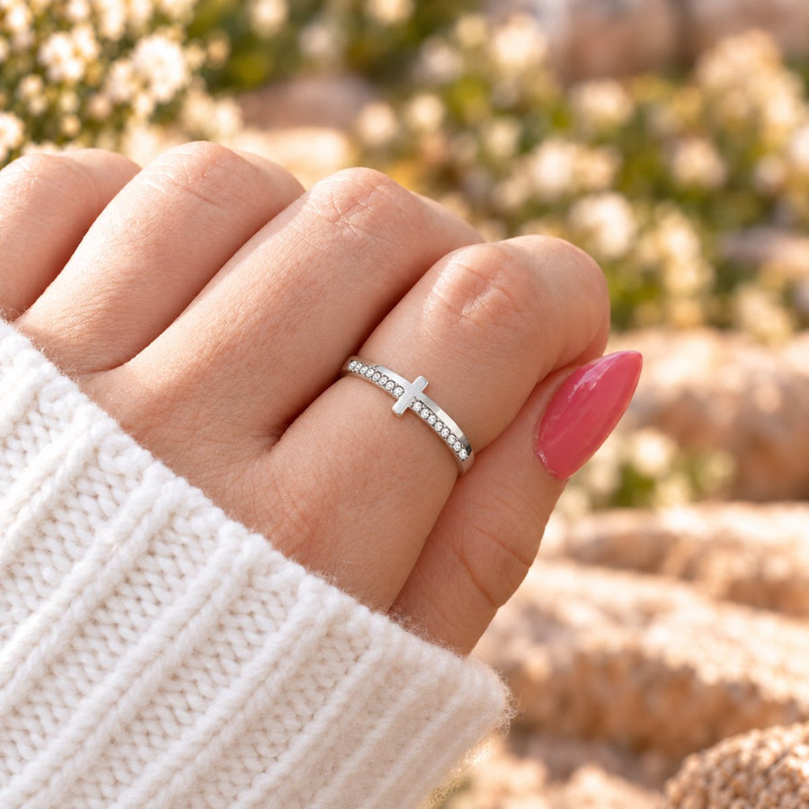 Let Go and Let God ring worn on a hand